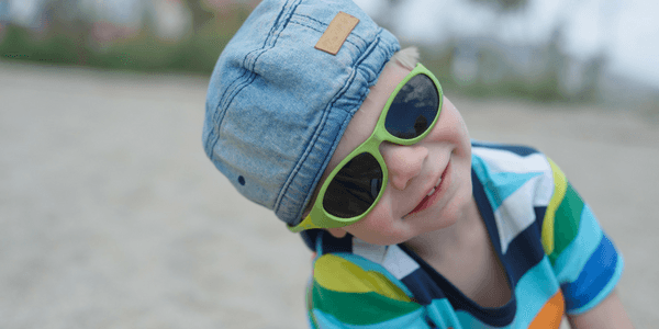 young boy in sunglasses